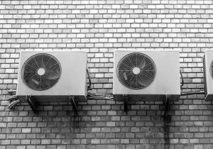 Two commercial air conditioning units installed next to each other